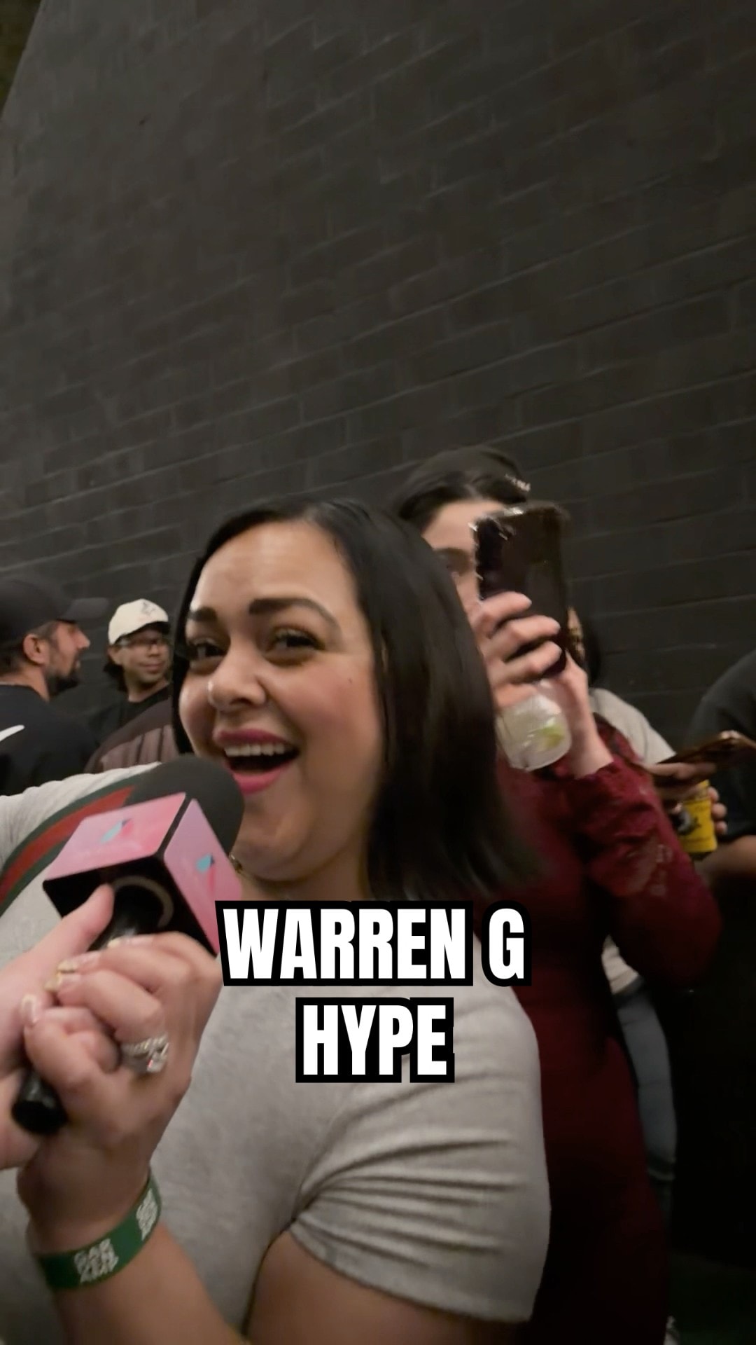 Fans reacting to Warren G at a live show